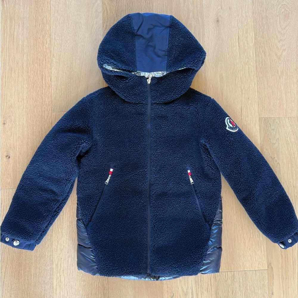 Moncler Boys down Jacket with shearling detail on the front, size 10.